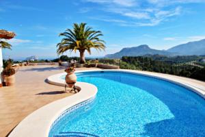 Bazén v ubytování Finca Fantaxat - holiday home with private pool and panoramic views in Benissa nebo v jeho okolí