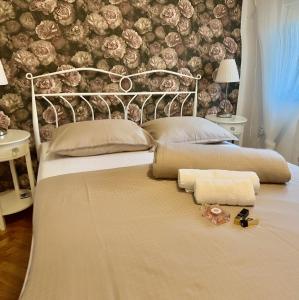 Postel nebo postele na pokoji v ubytování Apartments & Villa Tisno