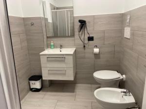 Ein Badezimmer in der Unterkunft Corridoni33 - Immobili e Soluzioni Rent