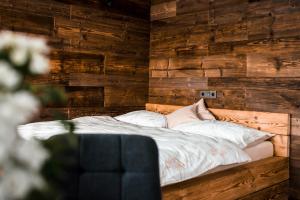 Postel nebo postele na pokoji v ubytování Apartmány ZeMě