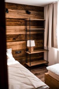 Postel nebo postele na pokoji v ubytování Apartmány ZeMě