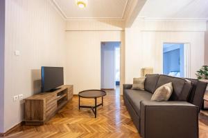 TV a/nebo společenská místnost v ubytování GK Niki by GK Properties