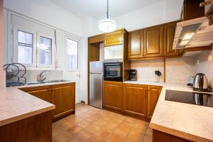 Kuchyň nebo kuchyňský kout v ubytování GK Niki by GK Properties