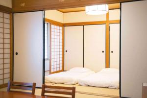 Кровать или кровати в номере Hilton Osaka Hotel