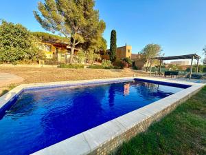 Bazén v ubytovaní Casa amb piscina i jardí a Palamós per 6 persones alebo v jeho blízkosti