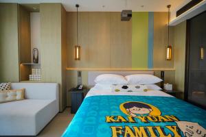 Postel nebo postele na pokoji v ubytování New Century Mansion Resort Hangzhou Xianghu Baoyi