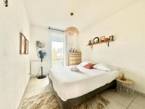 Postel nebo postele na pokoji v ubytování L'Arsène, un cocon avec terrasse + 21 fotografií