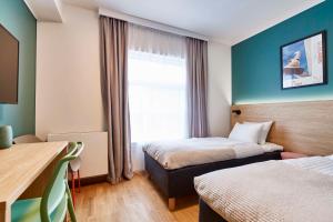 Postel nebo postele na pokoji v ubytování Aiden by Best Western Lolland