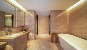 Koupelna v ubytování New Century Mansion Resort Hangzhou Xianghu Baoyi
