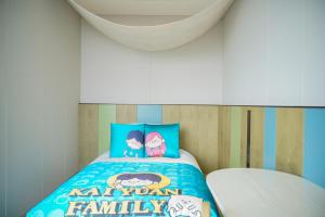 Postel nebo postele na pokoji v ubytování New Century Mansion Resort Hangzhou Xianghu Baoyi