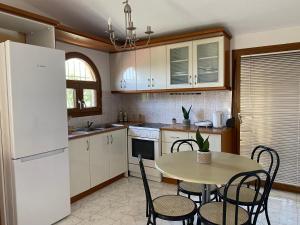 Kuchyň nebo kuchyňský kout v ubytování Yota's House