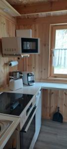 Kuchyň nebo kuchyňský kout v ubytování Ferienwohnung Erlebnisfarm John