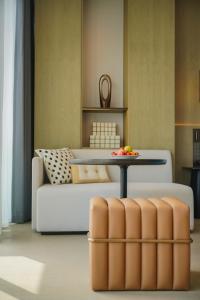 Posezení v ubytování New Century Mansion Resort Hangzhou Xianghu Baoyi