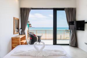 Postel nebo postele na pokoji v ubytování ZiVilla Private Pool Beachfront + 37 fotografií