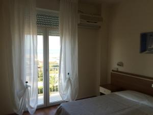 Postel nebo postele na pokoji v ubytování Hotel Mirage + 21 fotografií