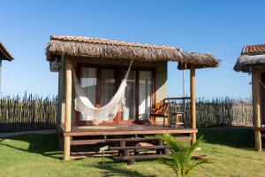 Zahrada ubytování Amigos do Vento Chalés e Kite Point + 50 fotografií