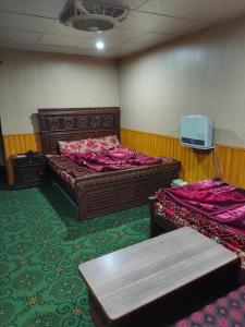 Postel nebo postele na pokoji v ubytování Ahmed guest house