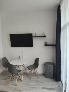 Μια τηλεόραση ή/και κέντρο ψυχαγωγίας στο Studio 3 Grand Kamelia Sunnybeach
