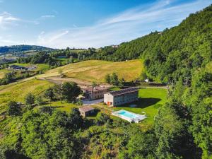 an aerial view of a house on a hill at Borgo Doccia 905 in Montese