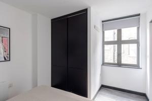 Ένα ή περισσότερα κρεβάτια σε δωμάτιο στο The "Slaycation" Crib - Soho - by Frankie Says +5 φωτογραφίες