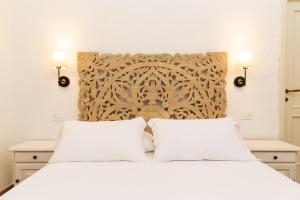 Postel nebo postele na pokoji v ubytování La Jacia Hotel & Resort + 37 fotografií