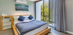 Postel nebo postele na pokoji v ubytování Luxury Pool Villa in Chalong + 34 fotografií