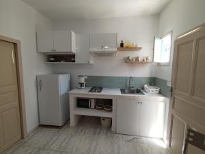 Η κουζίνα ή μικρή κουζίνα στο Appartement T2 60m2 Djerba Houmet Essouk
