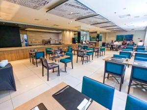 Restaurace v ubytování Stay Inn Santos Sua acomodação com cara de Hotel