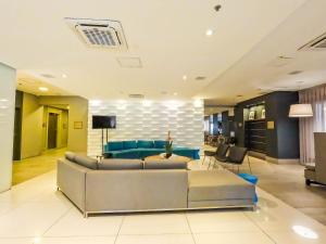 Stay Inn Santos Sua acomodação com cara de Hotel的休息区