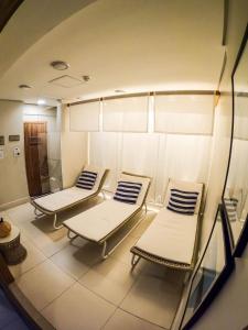 Stay Inn Santos Sua acomodação com cara de Hotel的休息区