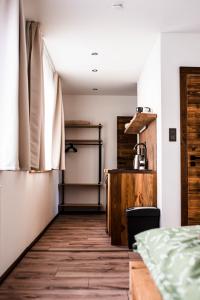 Postel nebo postele na pokoji v ubytování Apartmány ZeMě