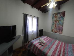 TV a/nebo společenská místnost v ubytování Amukan Guest House