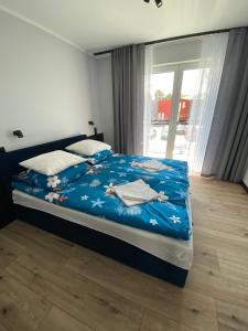 Postel nebo postele na pokoji v ubytování Baltic Stay