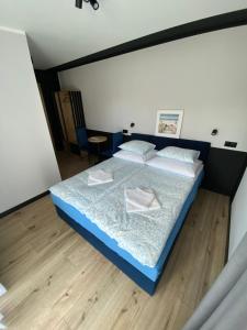 Postel nebo postele na pokoji v ubytování Baltic Stay