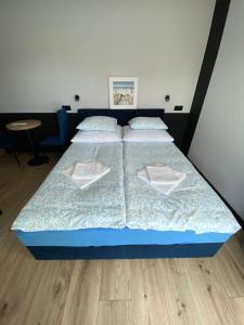 Postel nebo postele na pokoji v ubytování Baltic Stay