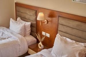 Voodi või voodid majutusasutuse prestige pyramids INN toas