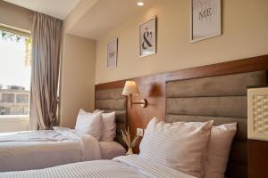 Voodi või voodid majutusasutuse prestige pyramids INN toas