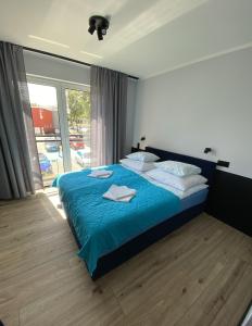 Postel nebo postele na pokoji v ubytování Baltic Stay