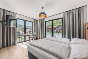 Posteľ alebo postele v izbe v ubytovaní ΛLPSTERN - Silvretta Card Premium Betrieb