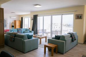 Istumisnurk majutusasutuses Elegant Apartments with Open Views