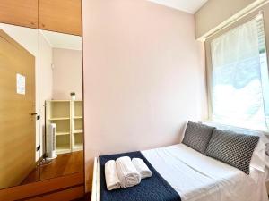 Postel nebo postele na pokoji v ubytování Bergamoinhouse airport