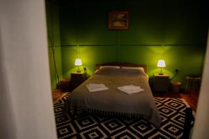 Ένα ή περισσότερα κρεβάτια σε δωμάτιο στο Shromantic Garden