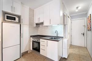 Kuchnia lub aneks kuchenny w obiekcie Luminoso apartamento en la Plaza del Charco
