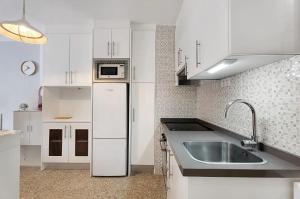 Kuchnia lub aneks kuchenny w obiekcie Luminoso apartamento en la Plaza del Charco