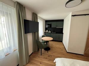 Appart Hotel Pitschonia Self Check-In客房内的一张或多张床位