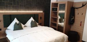 Appart Hotel Pitschonia Self Check-In客房内的一张或多张床位