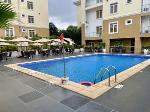 a swimming pool in the middle of a building at The Sojourner By Genesis in Ikeja