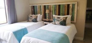 En eller flere senge i et værelse på Mountain Villa 238