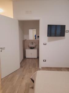 Kuchyň nebo kuchyňský kout v ubytování HOUSE AIRPORT Catania