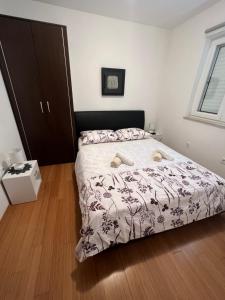 Postel nebo postele na pokoji v ubytování Donna Sandra